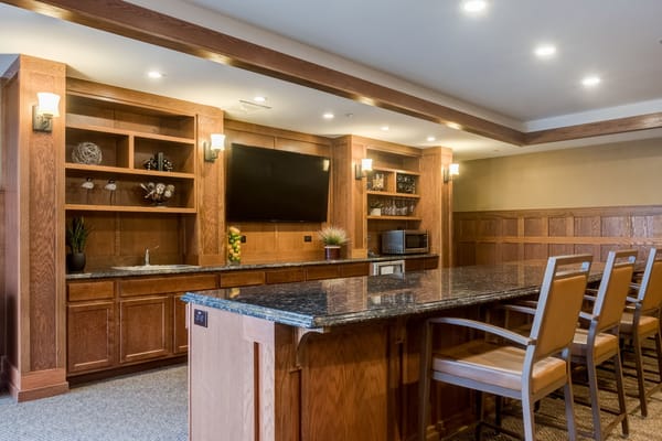 Interior common area with a bar and seating