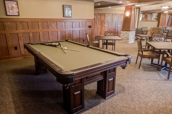 Interior view of a common area with a pool table