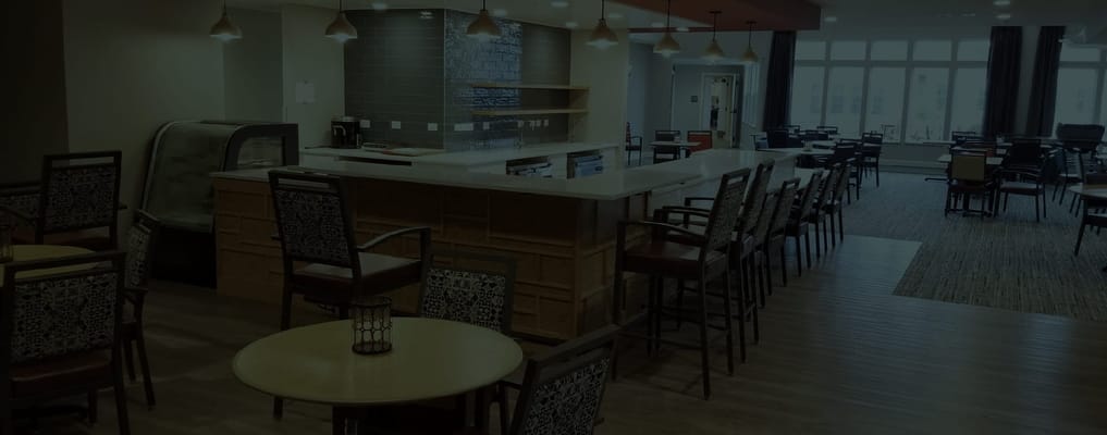 Bright dining area with modern decor and seating