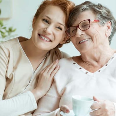 Caregiver and resident enjoying time together