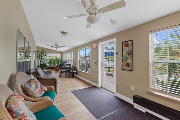 Bright common area with seating and plants