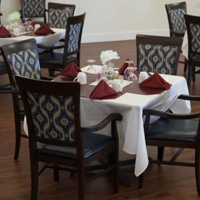 Dining table set for a meal in a dining room