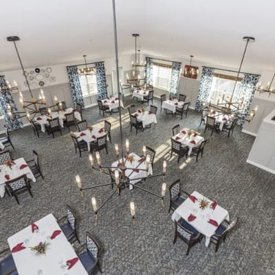 Bright dining room with elegant table settings