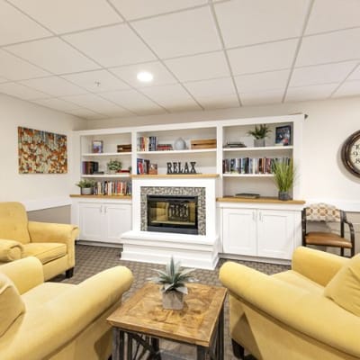 Cozy common area with seating and fireplace