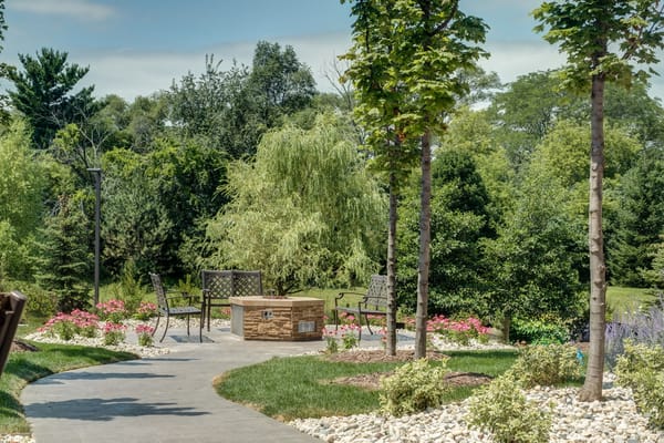 Peaceful outdoor seating area with flowering plants