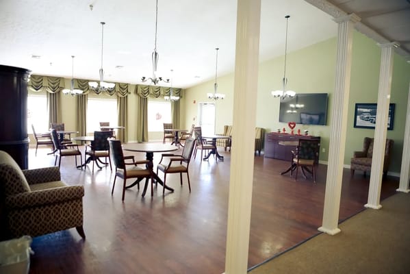 Interior view of a common area with tables and chairs