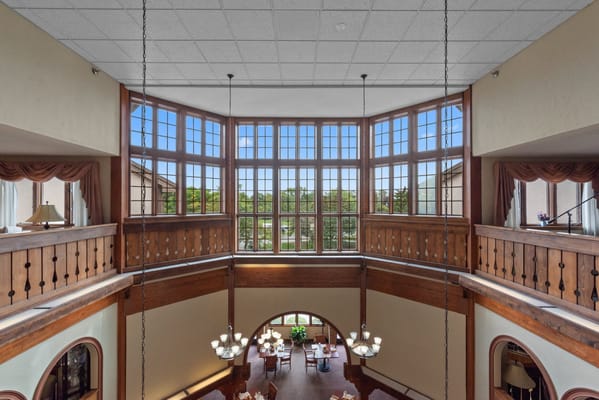 Interior view of a dining area with large windows