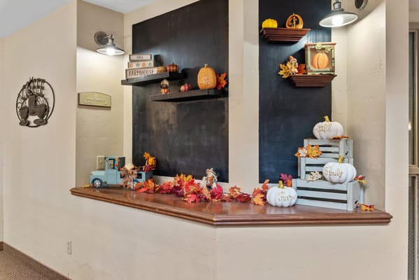 Decorative autumn-themed display in a common area