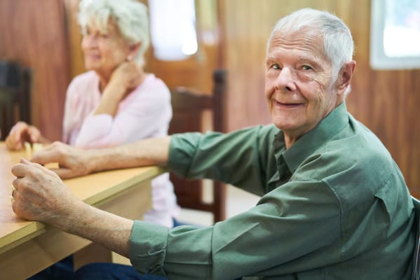 Residents enjoying a leisure activity in a common area