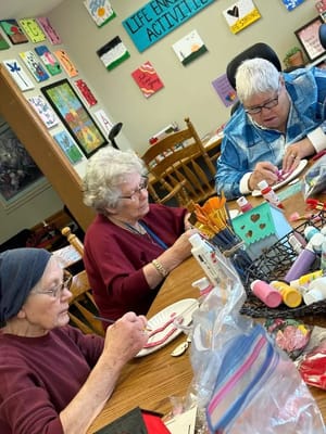 Residents crafting in an activity room