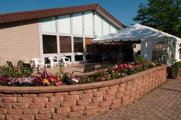 Exterior view of outdoor seating area and garden