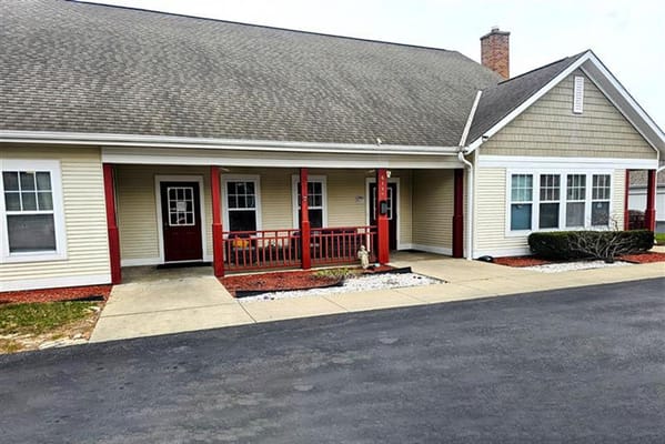 Exterior view of a residential facility with porches