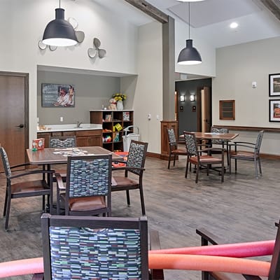 Bright common area with tables and chairs
