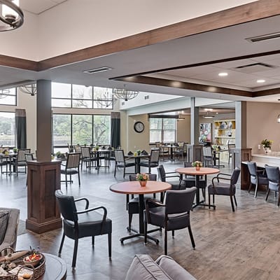 Bright dining area with tables and chairs