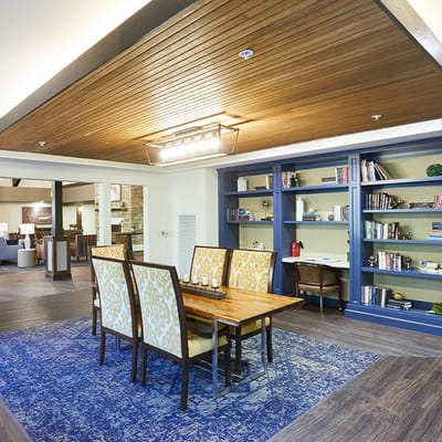 Common area with seating and bookshelves
