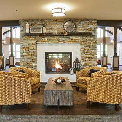 Comfortable common area with a fireplace and seating
