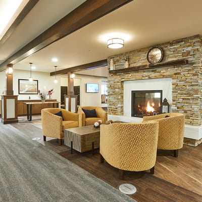 Cozy common area with seating and a fireplace