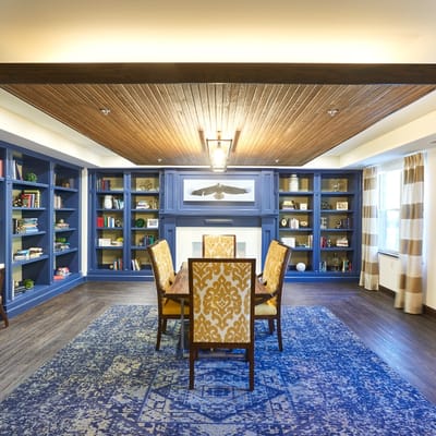 Interior common area featuring a dining table and bookshelves