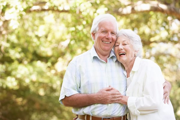 Happy elderly couple enjoying time outdoors