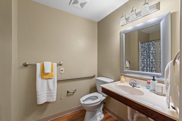 Brightly lit bathroom with modern amenities
