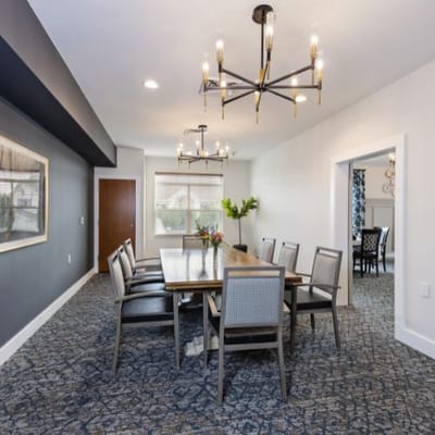 Bright dining area with modern lighting and decor