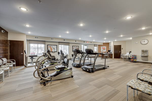 Interior view of a fitness room with exercise equipment