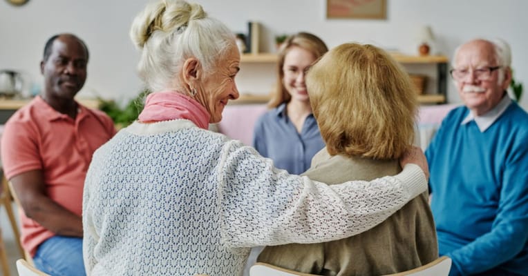 Residents in a conversation in a common area