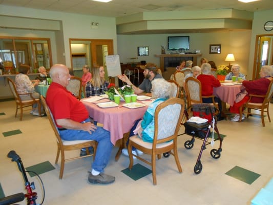 Residents enjoying a social gathering in the common area