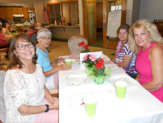 Residents enjoying a meal together in the dining area