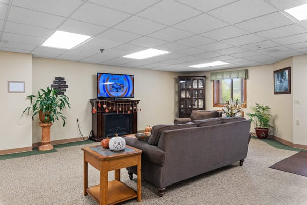 Interior common area with seating and television