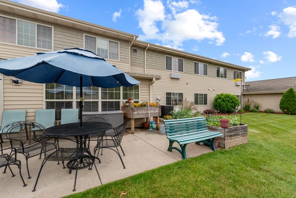 Patio area with seating and garden plants