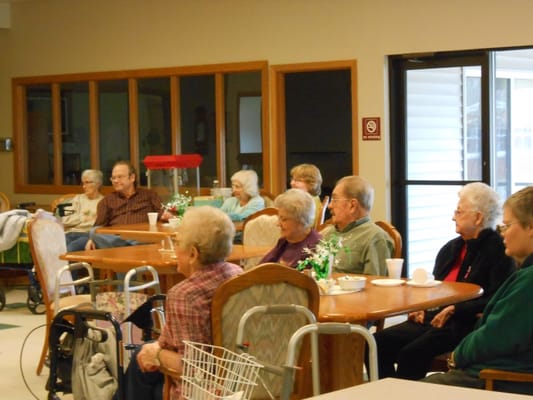 Residents engaging in conversation in a common area