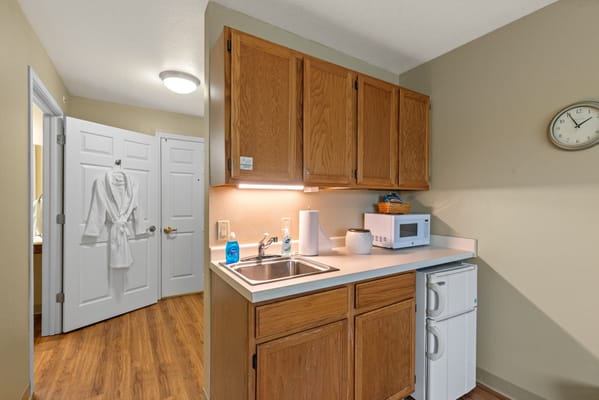 Well-equipped resident kitchenette in a private room