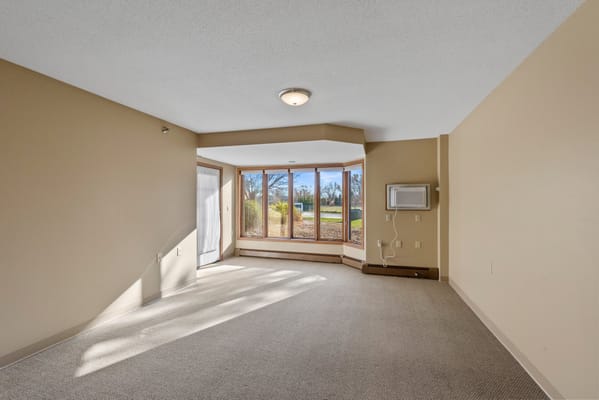 Bright interior room with large windows and a view
