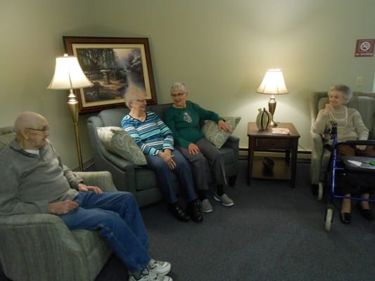 Residents sitting in a common area lounging