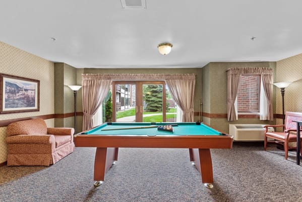 Interior view of a common area with a pool table