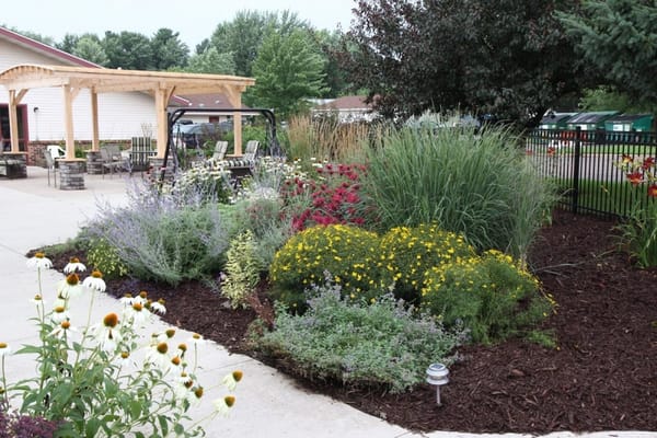 Beautifully landscaped outdoor area with flowers and greenery