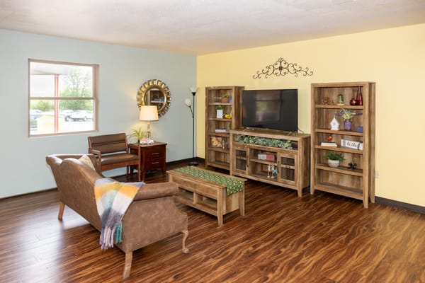 Cozy common area with seating and TV