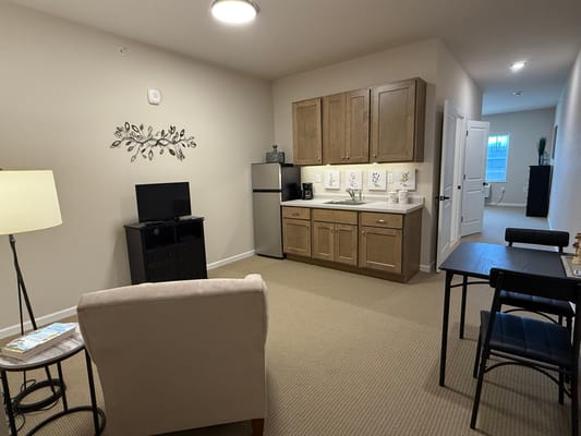 Cozy interior of a resident room with kitchenette