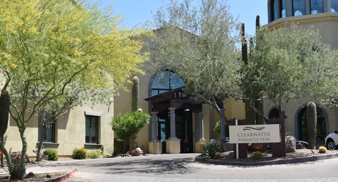 Exterior view of Clearwater Pinnacle Peak with landscaping