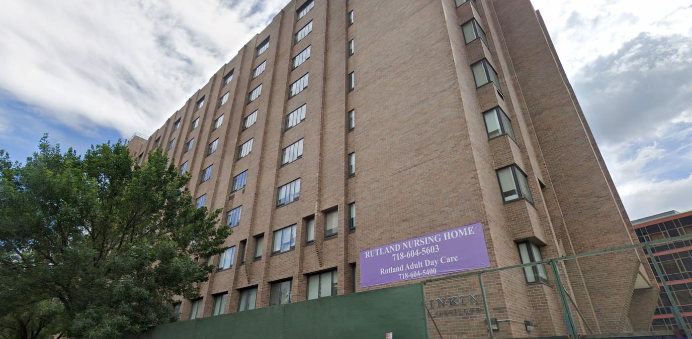 Exterior view of Rutland Nursing Home with signage