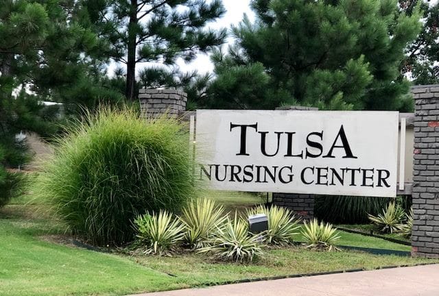 Sign of Tulsa Nursing Center at the entrance