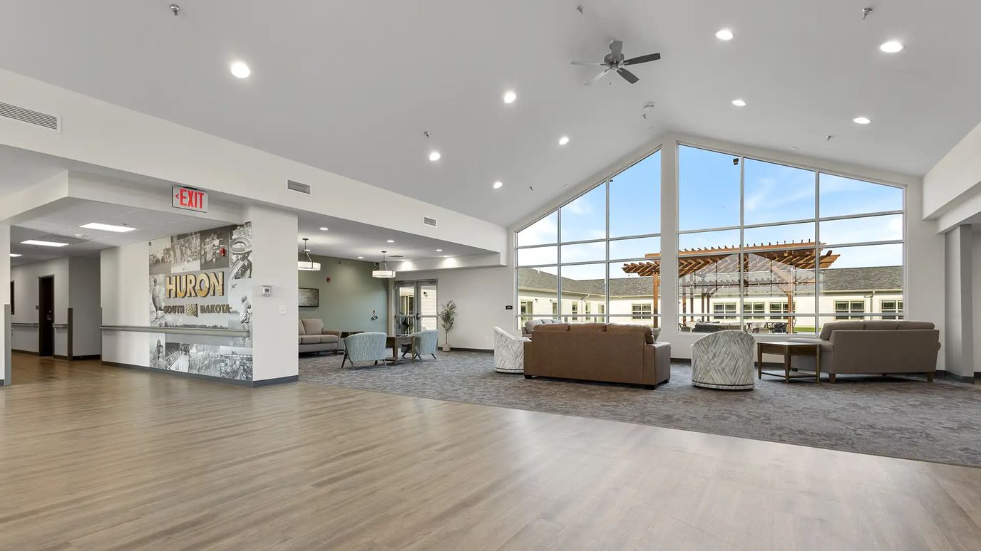 Interior view of a spacious common area with seating
