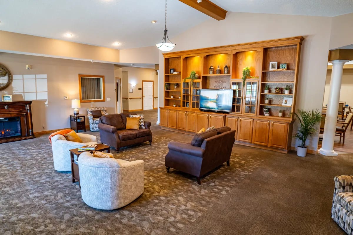 Interior view of a common area with seating and TV