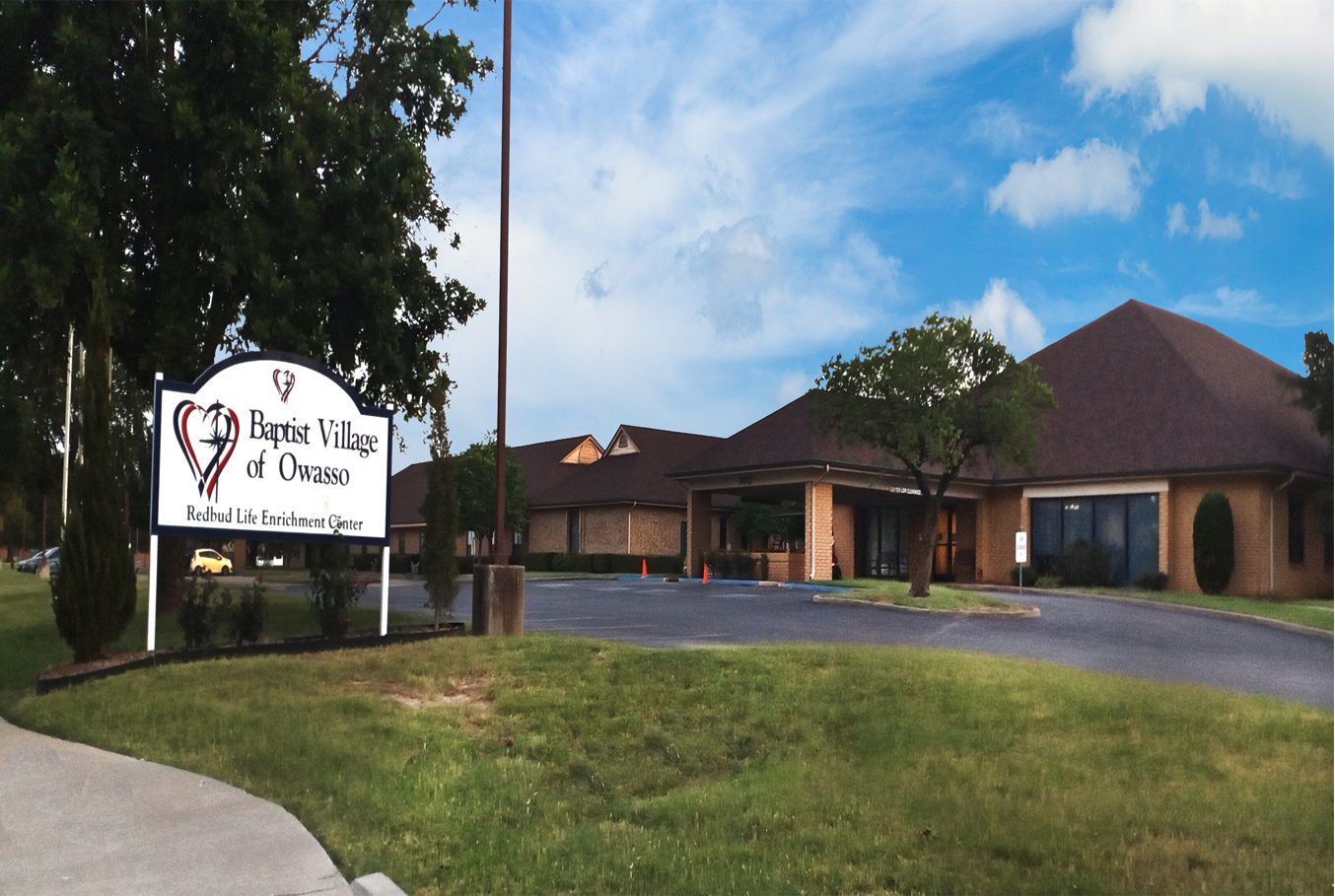 Exterior view of Baptist Village of Owasso building and signage