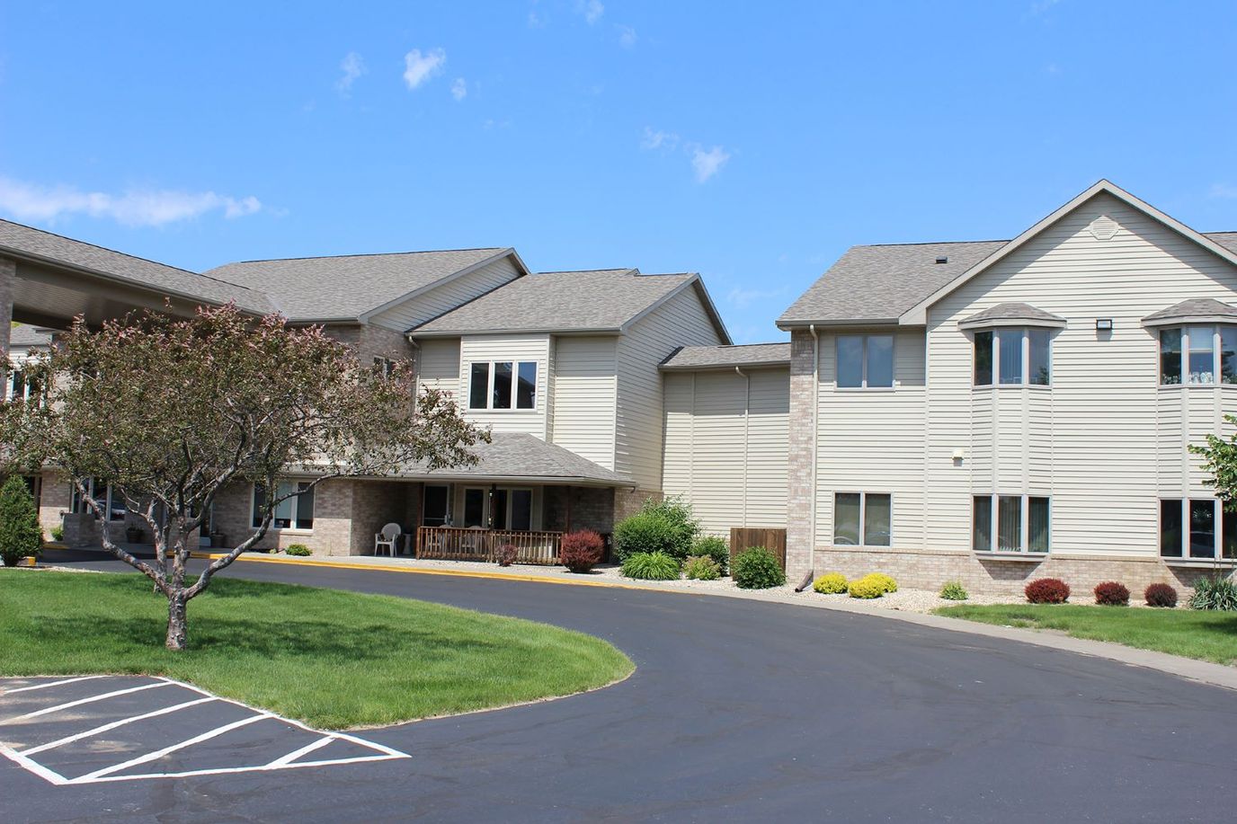 Exterior view of Countryside Living facility with landscaped grounds