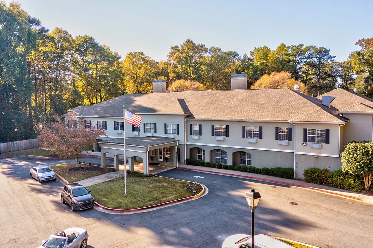 Exterior view of Greenwood Place with surrounding trees