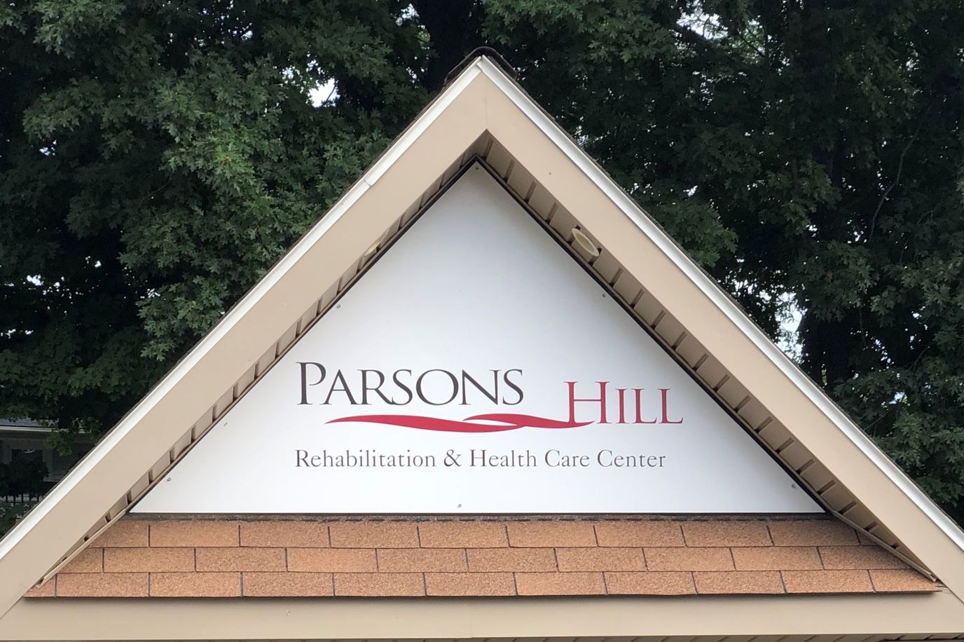 Facility logo on the building exterior