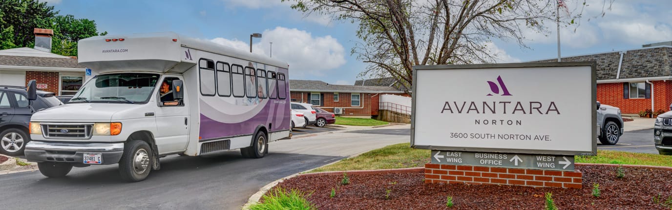 Facility shuttle bus near the entrance