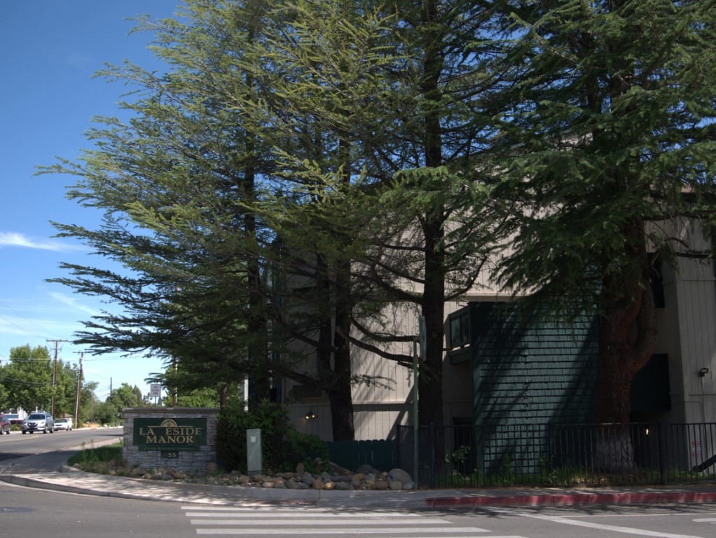 Lakeside Manor building entrance surrounded by trees